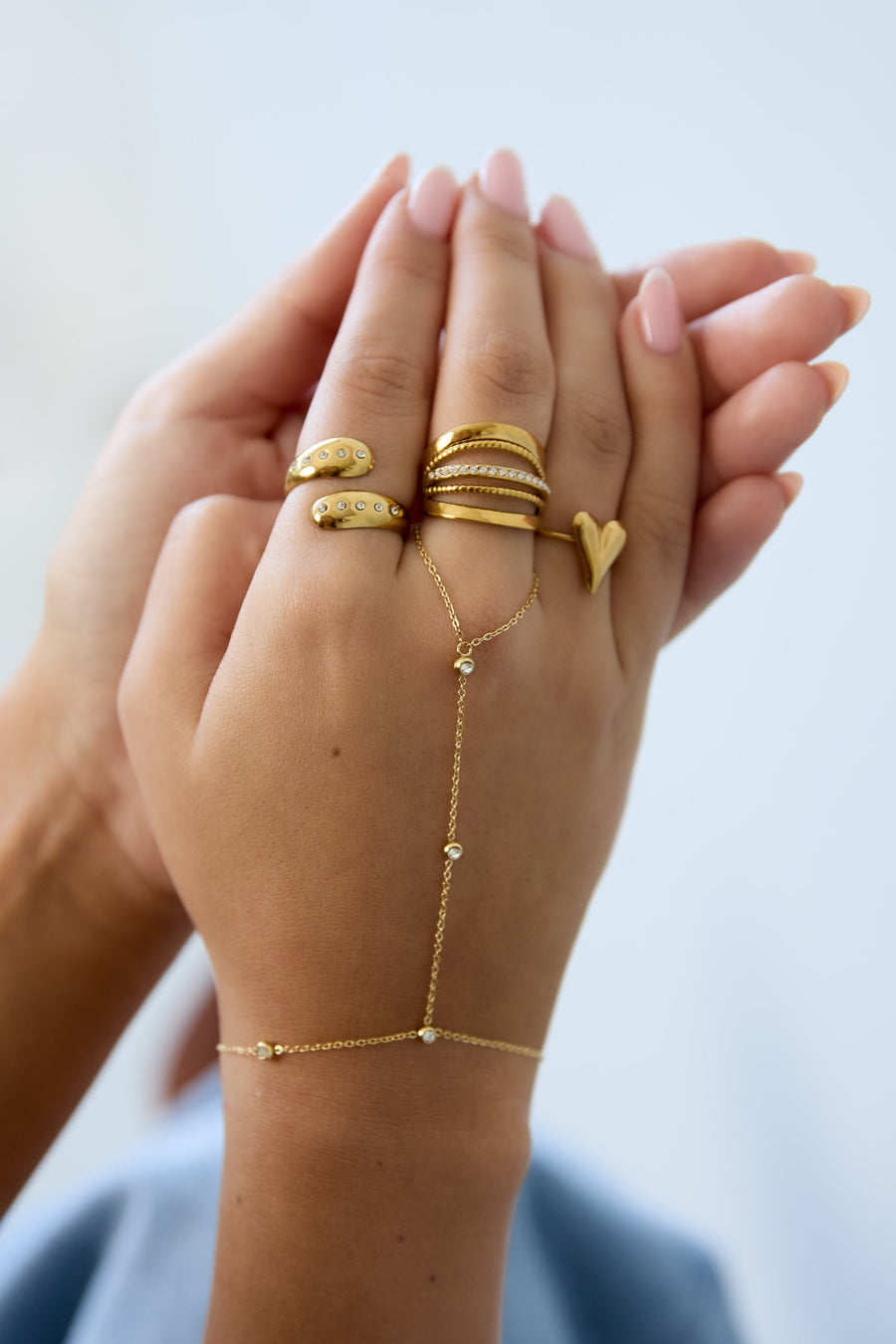Asymmetrical Stone Hand Chain · gold · model